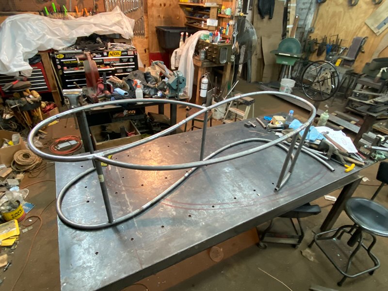 Demonstration of bench being made a metalsmith workshop