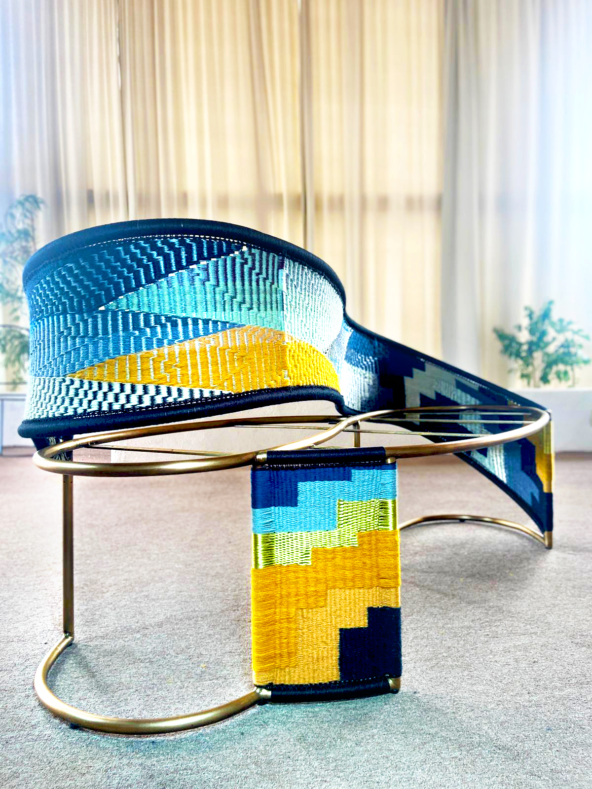 Demonstration of bench being waved with colorful threads